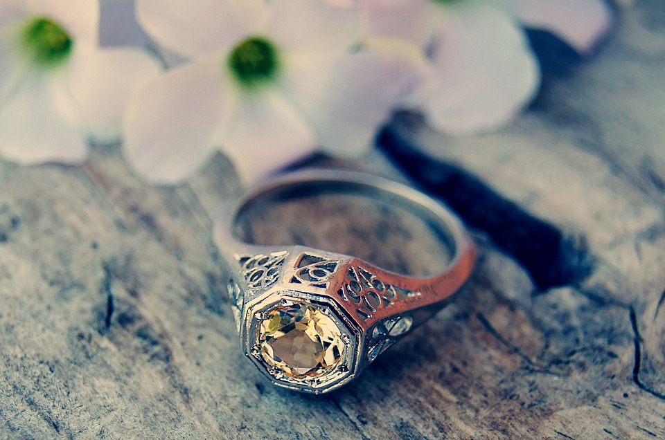 ring with a yellow stone
